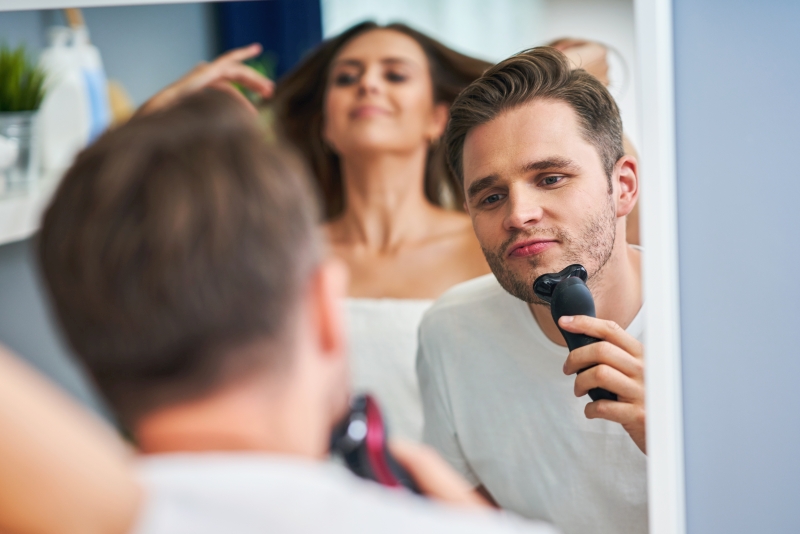 Happy young couple in the bathroom